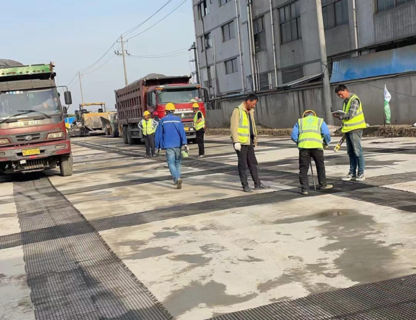 惠阳老材料的新故事：玻璃纤维土工格栅如何在‘白改黑’浪潮中重获新生？